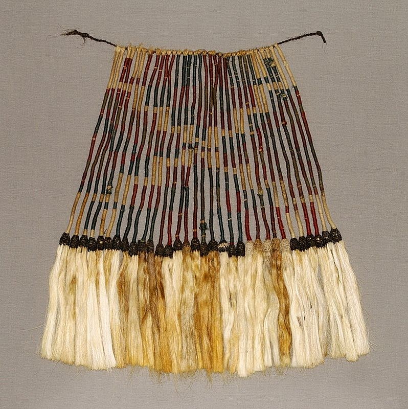 Chile, Arica Small Loincloth
The lion cloth is comprised of 32 individually wrapped strands of vicuna. The design of the Andean cross appears when the strands are aligned. A similar small mens loincloth is illustrated in Arica Diez Mil Anos, Museo Chileno (1985: 57).
Media: Textile
Dimensions: Height: 12" x Width: 14"
$6,500
M8063