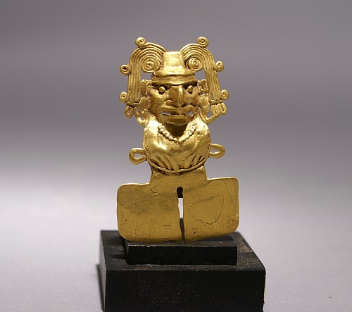 Metal: Mixtec Gold Figural Pendant of Xochipilli with ornate headdress. Price Upon Request
