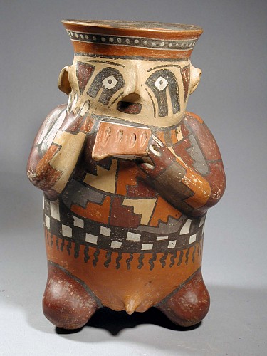 Peru - Nazca Polychrome Effigy Jar with Flute Player $14,000