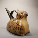 Peru, Wari Single Spout Owl Effigy Vessel in tan with black highlights
Ceramic