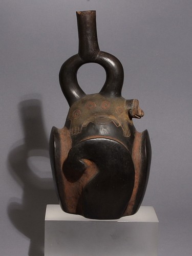 Peru - Chavin Tembladera Style Stirrup Spout Vessel Decorated with Sea Lion Deity $9,000