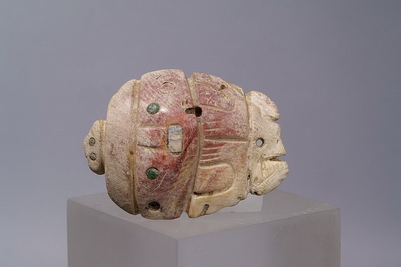 Peru, Chimu Shell Turtle Pendant
This turtle head and carapace have inlays of turquoise and mother of pearl.  This is an unusually large shell, carved with double imagery.  A human figure appears on the carapace when the pendant is vertical.  When horizontal, the shell appears as a turtle, with a small head at the top, and tail and rear flippers at the bottom.  From a Private New York collector prior to 1980's.  Published in Ocean Fishing in Pre-Columbian Chile and Peru, plate 60.
Period: Peru, Chimu, North Coast, circa AD900-1350
Media: Shell
Dimensions: Height: 3" inches
Condition: As found with original inlays.
$2,900
M8027