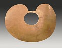 Colombia, Calima Gold Kidney Shaped Nose Ornament with Satin Finish
Metal