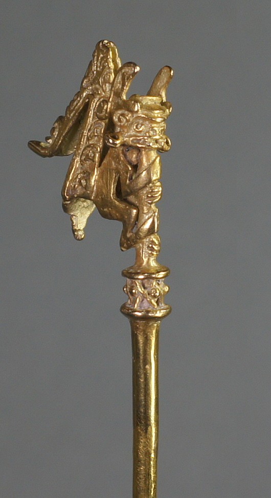 Colombia, Early Calima Gold Lime Dipper
A fine lost wax cast lime dipper with a mythological monkey deity on the tip.  The monkey is wearing a helmet, ear spools, and an elaborate headdress which falls down the back of his body.   The monkey is grasping the shaft of the lime dipper.  Lime dippers were used to administer lime for the coca ceremony.  According to the research, only limited types of images were used for lime dippers, usually shamans or warriors.  (See "Calima and Malagana," by Marianne Cardale Schrimpff).   A similar but not exact motif is illustrated in ORFEBRERIA PREHISPANICA DE COLOMBIA  Vol. Estilo Calima - Laminas Page 84  Num. 5232.
Period: Colombia, Calima, Yotoco Phase, Cauca River Valley, c. AD 100 - 1000
Media: Metal
Dimensions: Length 8 1/2"
$12,000
97146