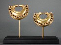 Colombia, Tairona Pair of gold lost wax cast ear ornaments decorated with braidwork
Metal