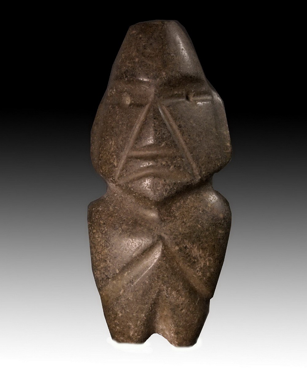 Mexico, Classic Brown Stone Mezcala Figure of the M8 Type
This hand-held stone figure fits perfectly in the palm of the hand and bears a distinctive facial expression with round eyes and a triangular frowning mouth.  The figure was created using the string-sawing technique and is made of a greenish grey stone with earth brown striations.  It was highly polished.  The figure has its arms to the side, represented by carved grooves, and linear carved face, which are both characteristics of Type M10 Mezcalas.  The representation of human figures played an important role in Mezcala culture, including in rituals and burial sites.  However, most of these figures, were used for utilitarian purposes as celts or chisels.  For a reference see the Primitive Museum of Art's MEZCALA STONE SCULPTURE: THE HUMAN FIGURE, p.22-23, and MEZCALA: ANCIENT STONE SCULPTURE FROM GUERRERO MEXICO, by Carlo Gay and Frances Pratt. Ex. Gallery Hana-Tokyo, prior to 1970.
Media: Stone
Dimensions: H: 5 in. x 2.33 in.
$5,550
n5057
