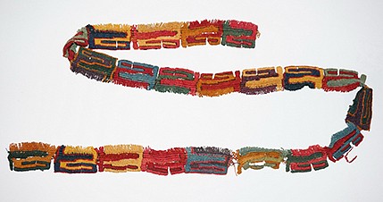 Peru, Knotted Textile Fringe with very colorful abstract motif.
This knotted fringe is distiguished by its brilliant colors.  It has an abstract "z" motif repeated along the band.  It is not woven on a loom, but is created by a method referred to as "tubular looping".  Looping is a single element technique in which the free end and full length of the yarn are pulled through previous work at the edge of the fabric to form each new loop.  Looping predates the domestication of fiber-bearing plants and animals and the invention of weaving in the Americas and possibly Eurasia.
Media: Textile
Dimensions: length 61 inches; width 2 inches
$2,100
91105