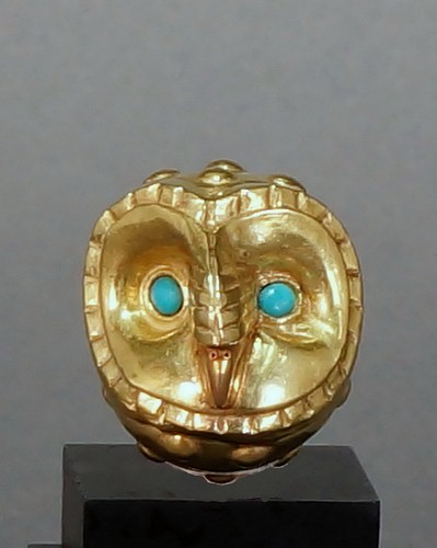 Metal: Moche Small Gold Male Condor Bead with Turquoise Eyes $5,000