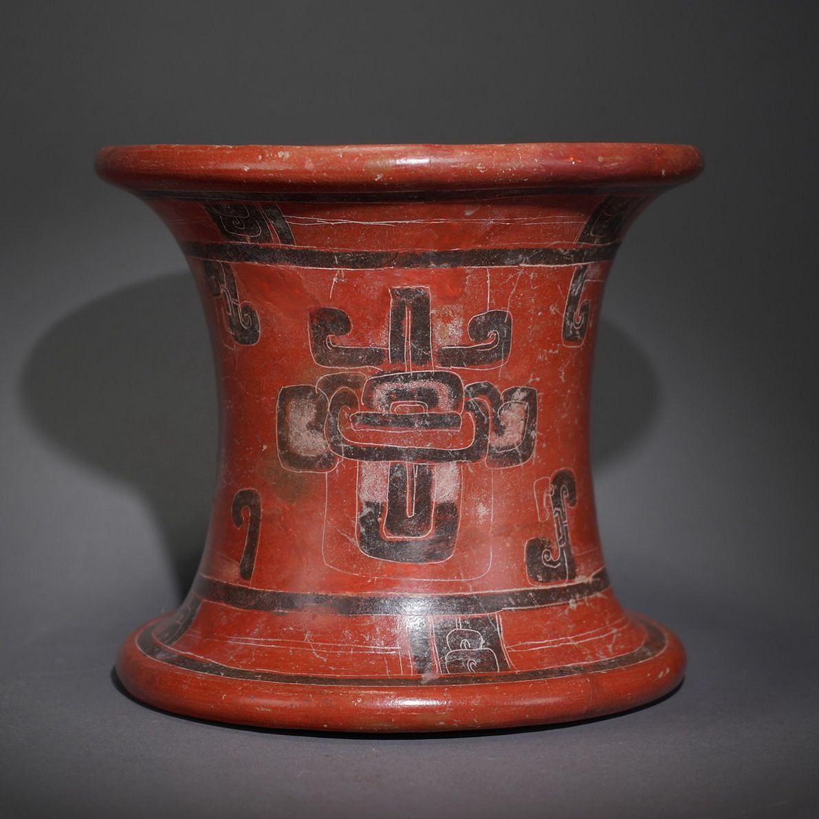 Costa Rica, Rosales Ceramic Pedestal  Engraved with Glyph Designs
This pedestal is decorated with incised glyphs outlined in black on red ground in three registers.  The Rosales artists' ceramics  were highly prized and were  traded throughout the Nacoya peninsula.
Media: Ceramic
Dimensions: Diameter 7 1/4" Height 6 1/2"
$4,450
94114