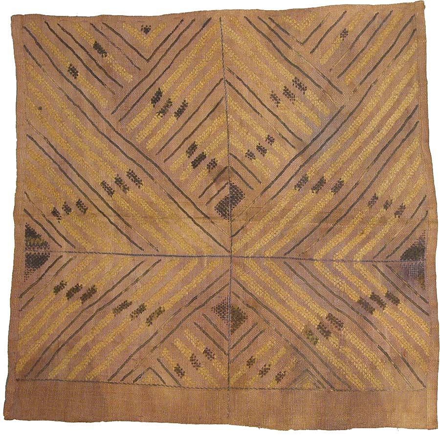 Zaire, Dekese (Kuba Kingdom) Raffia Panel with X-shaped Motif
Woven palm-leaf fiber panel embroidered with four variations on the same V-shaped motif which intersect to form a large â€œX.â€  The panel was embroidery cut to form a pile surface, resembling velvet.  This panel was brought back by one of the members of H.M. Stanley's famous expedition to Central Africa in the late 1800's.
Period: Congo, Kuba, 20th Century
Media: Textile
Dimensions: Length  23.5" x Width 23.5"
$450
M4089