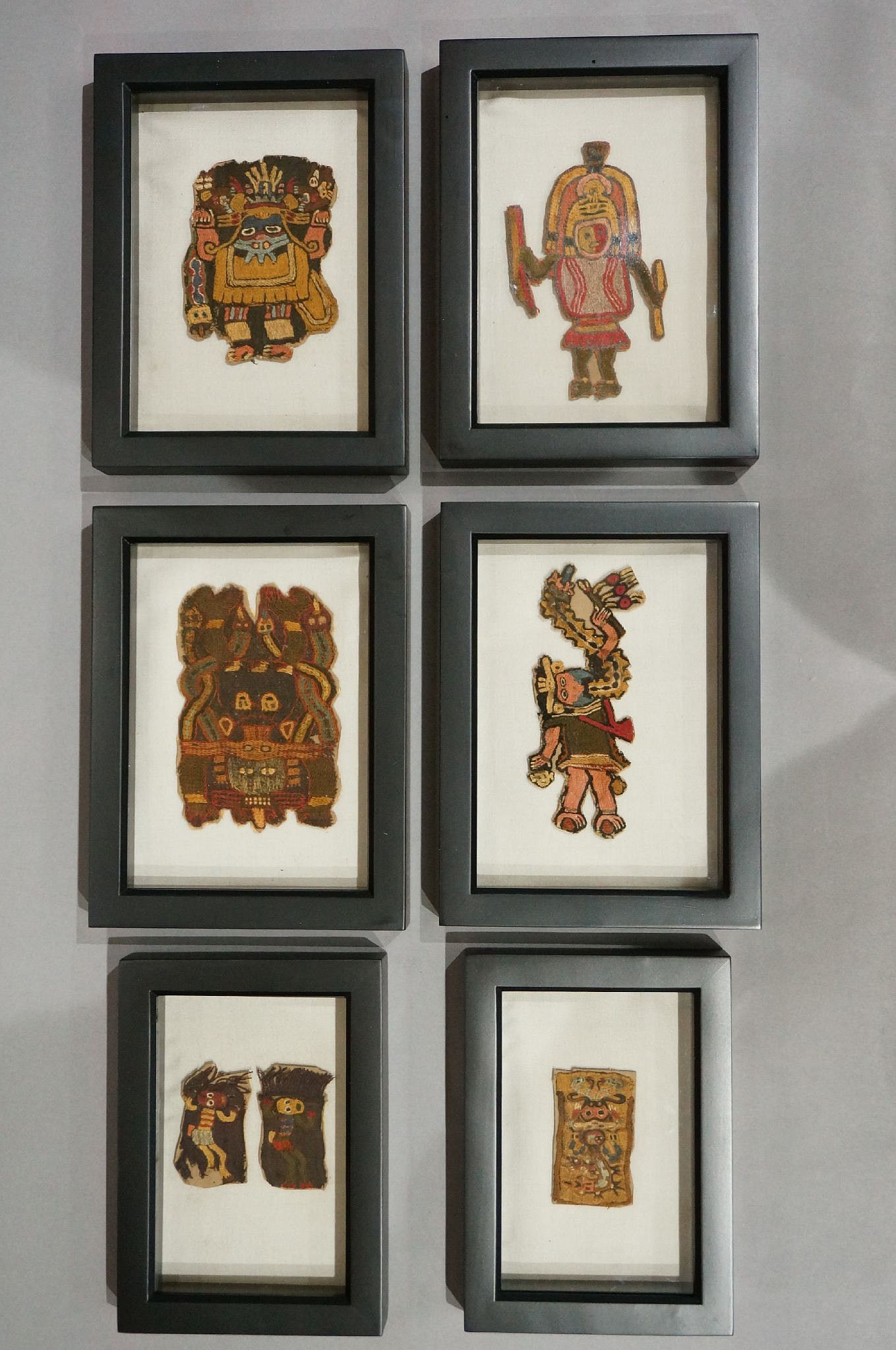 Peru, Paracas Embroidered Group of 6 Textile Sections
These figures represent different shamans in different states of transformation. The same subjects are illustrated in Alfredo Taullard’s Tejidos y Ponchos Indigenas de Sudamérica, Buenos Aires: Editorial Guillermo Kraft Limitada, 1949.  These Paracas sections were excavated in the 1920s and were sent to various museum collections in Europe and the US.
Mounted on cardboard backing and reframed.
Acquired by David Bernstein in 2019. Period: Peru, Paracas, South Coast, c. 200 - 100 BC

Media: Textile
Dimensions: Length varies from 3 to 4 inches.
$12,000
n9048