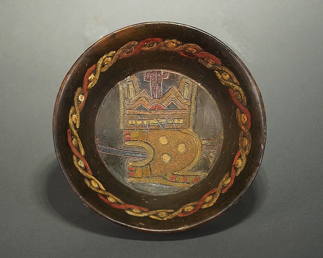 Peru, Paracas Phase 8 High Fired Ceramic Flared Dish with Feline in Profile
The dish is incised and painted with a feline in profile looking outwards. His pointed ears and brows are from Callango, phase 8. The upper edge is painted with a geometric intertwining helix design in red and yellow.  On the outside rim is an incised and painted band of three intertwined designs.  A similar dish is described in THE PARACAS POTTERY OF ICA by Menzel, Rowe, and Dawson, U.C Berkley, 1964, page 125, figs. 19-5k, and page 363, fig. 45.  Estate of Ernst Barash prior to 1969. 
Period: Peru, Paracas, Callango, Phase 8, South Coast, c. 700 - 200 BCMedia: Ceramic
Period: Peru, Paracas, Callango, Phase 8, c. 300 - 200 BC
$4,000
n4047