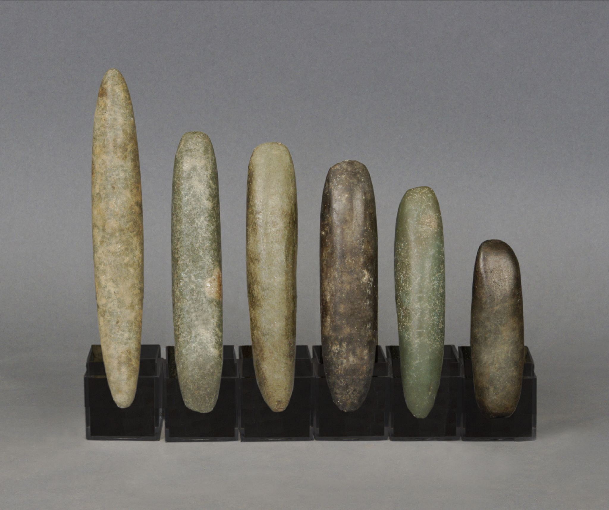Dominican Republic, Six Pre-Taíno  Gray-Green Stone Chisels
These chisels are nicely polished and do not show wear.   They were most likley used for ceremonial purposes.
Period: Dominican Republic, Courian Subseries, c. 2000 BC - AD 250
Media: Stone
Dimensions: Length: 3" to 5 1/2"
98266