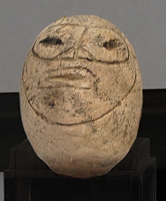 Dominican Republic, Small Tan Stone Ball with Incised Face
The face has eyes encircled with a mask. This stone could have been used as a talisman.
Period: Dominican Republic, Saladoid Culture, Pre-Taíno , c. 400 BC - AD 600
Media: Stone
Dimensions: Height: 1 1/8"
99365B