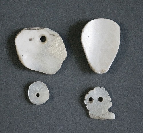 Work: Four Taíno  Carved Mother of Pearl Beads