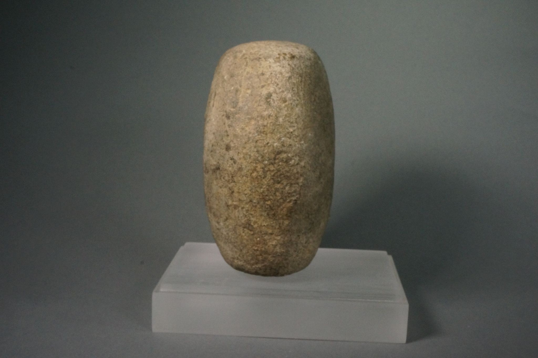 Dominican Republic, Pre-Taíno  Large Oblong Pounding Stone
This is a Saladoid stone tool. The flat ends were for used pounding plants and foodstuffs, and the curved sides for grinding.
Period: Dominican Republic, Courian Subseries, c. 2000 BC - AD 250
Media: Stone
Dimensions: Length: 4 1/2" x Height: 2"
n7006