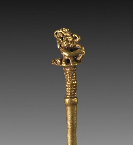 Work: Calima Gold Tupu (Lime Dipper) of a Deity Seated on a Serpent $8,250
